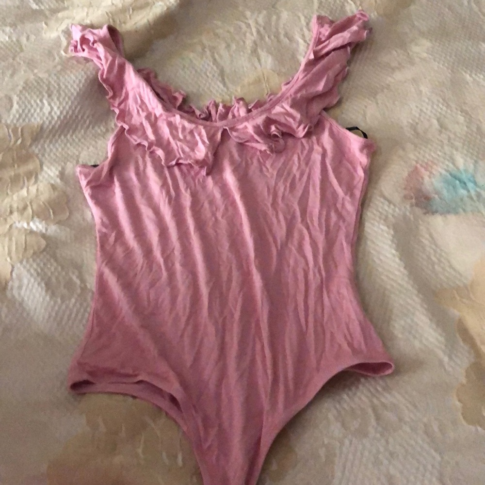 Pink ruffle sleeve body suit